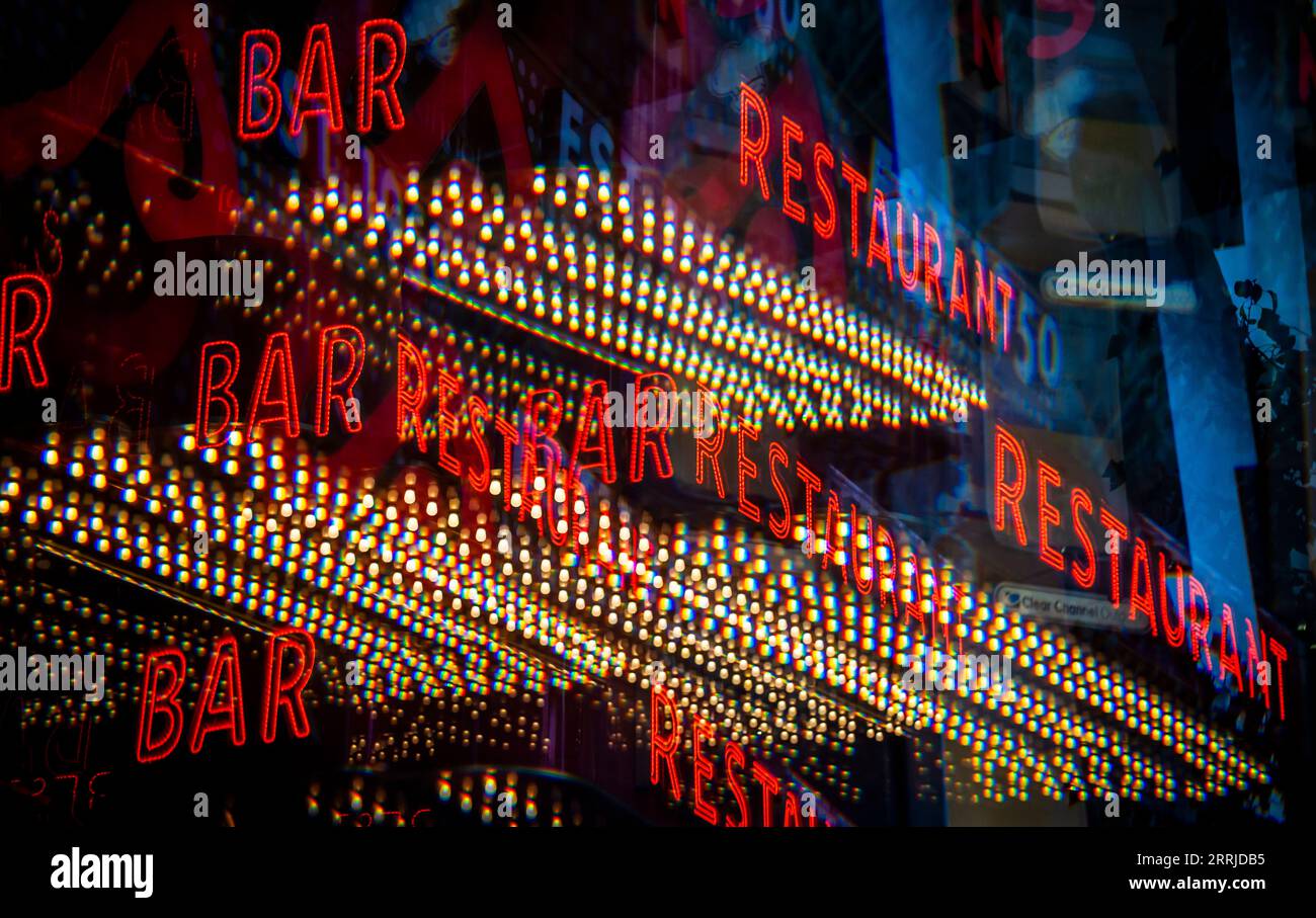 Entrance marquee to a Times Square branch of Junior's Restaurant in New York on Wednesday, September 6, 2023. (© Richard B. Levine) Photographed with a prism filter. Stock Photo