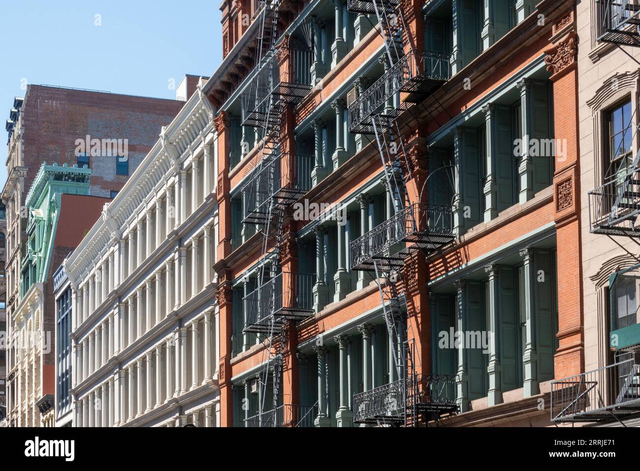 SoHo is an historic district in New York City featuring cast iron ...