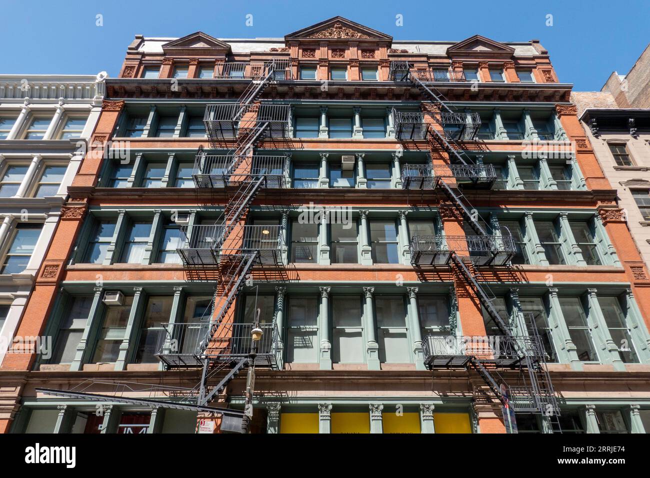 SoHo is an historic district in New York City featuring cast iron architecture, USA  2023 Stock Photo