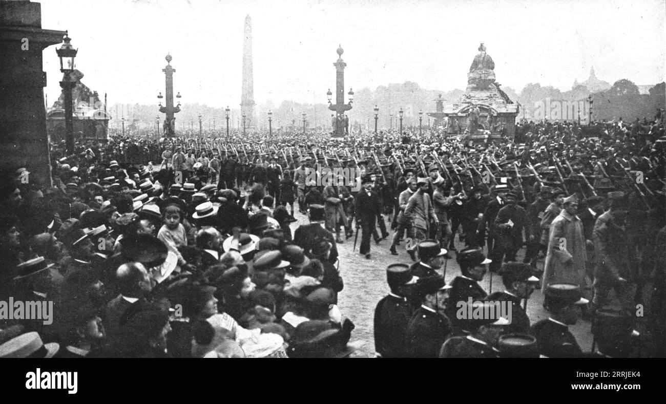 &quot;Independence Day&quot; In Paris; A battalion of the 16th American regiment, in ranks of four, cross Place de la Concorde to go to the cemetery of Picpus:where, on the tomb of La Fayette, General Pershing sounded a bugle call with his famous word : &quot;Lafayette, here we come!&quot; ', 1917. From &quot;L'Album de la Guerre 1914-1919, Volume 2&quot; [L'Illustration, Paris, 1924] . Stock Photo
