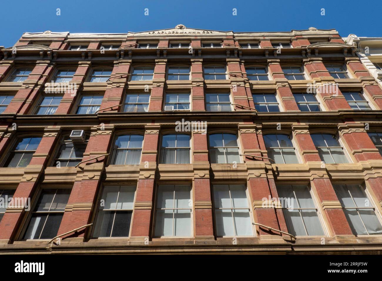 SoHo is an historic district in New York City featuring cast iron architecture, USA  2023 Stock Photo