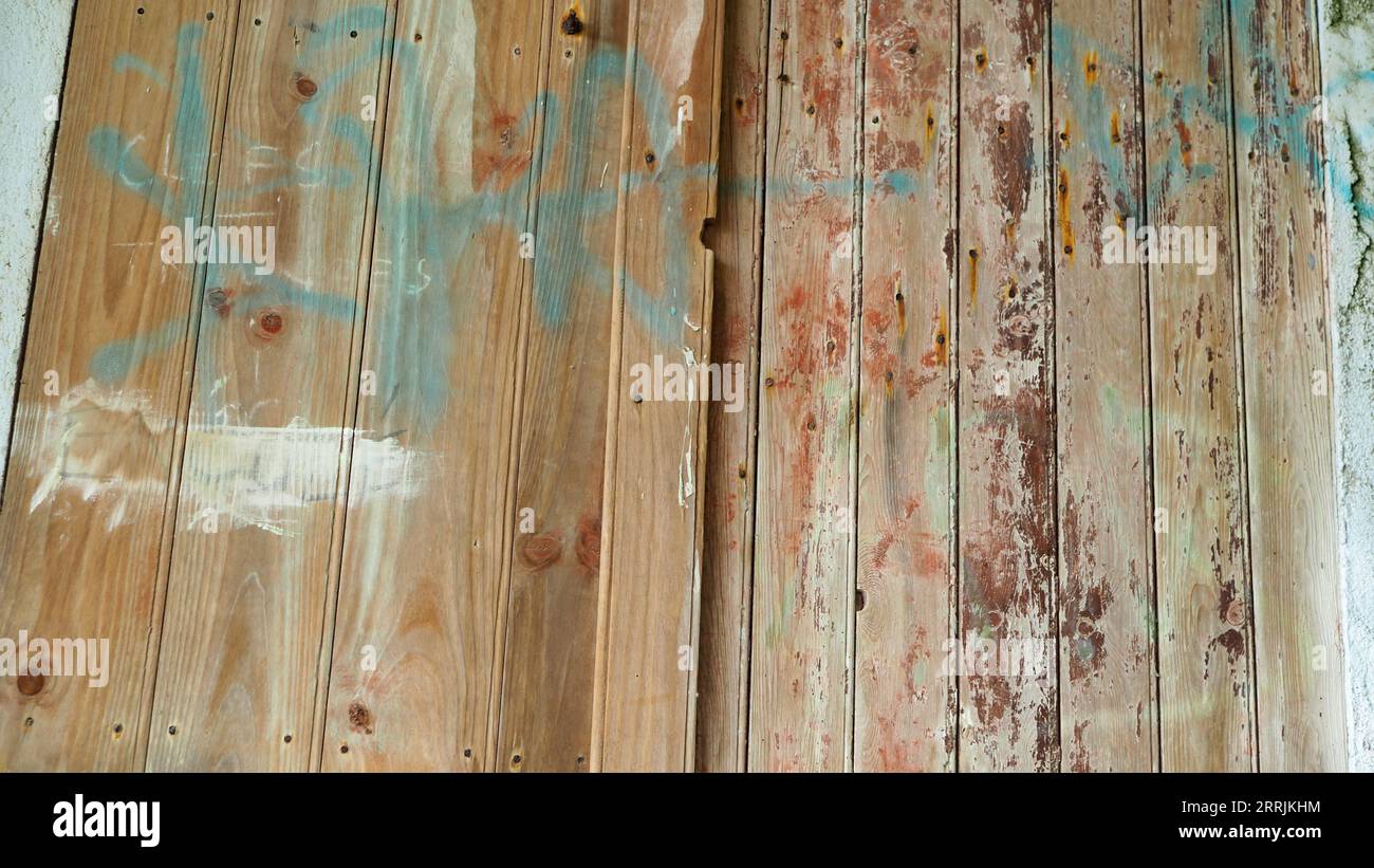 Rustic, weather-worn, boat house door Stock Photo