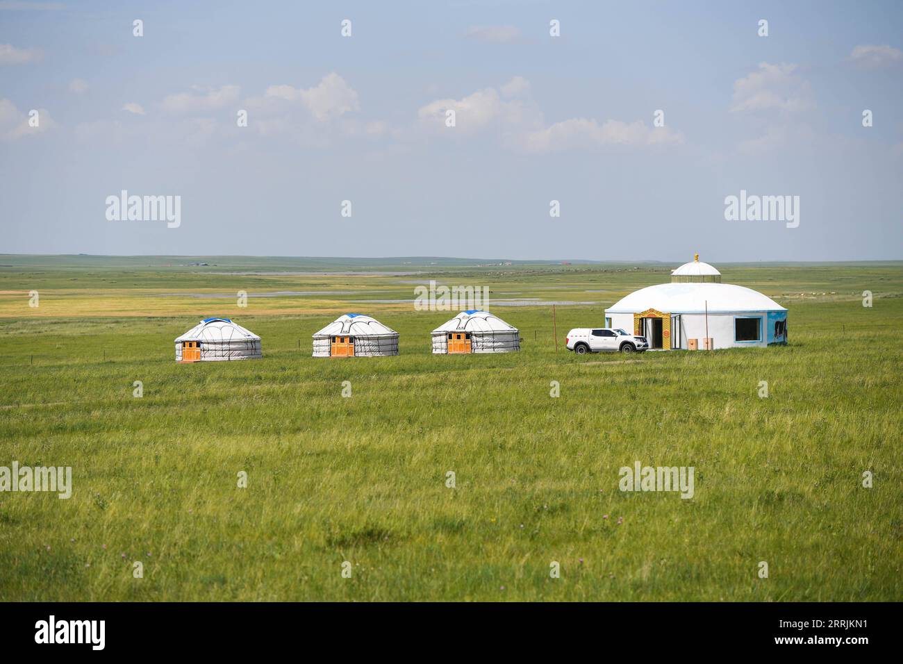220729 -- XILINGOL, July 29, 2022 -- Photo taken on July 27, 2022 shows Mongolian yurts on a grassland in East Ujimqin Banner of Xilingol League, north China s Inner Mongolia Autonomous Region.  CHINA-INNER MONGOLIA-XILINGOL LEAGUE-GRASSLAND-SUMMER CN LiuxLei PUBLICATIONxNOTxINxCHN Stock Photo