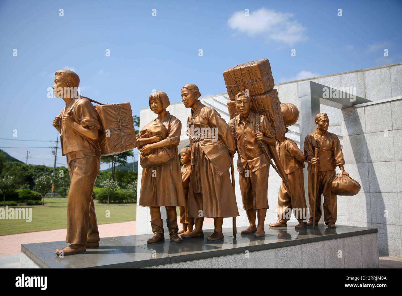 220729 -- CHUNGCHEONGBUK-DO, July 29, 2022 -- A statue to commemorate the No Gun Ri massacre is seen in Yeongdong County in Chungcheongbuk-do, South Korea, on July 28, 2022. The No Gun Ri massacre, one of the deadliest assaults the U.S. army had committed during the Korean War, had been buried deep in history, until The Associated Press uncovered the horrible tragedy in 1999. After the outbreak of the war, U.S. troops soon suffered setbacks while forces of the Democratic People s Republic of Korea DPRK were marching forward. On July 26, 1950, out of the fear that the DPRK guerrilla troops migh Stock Photo