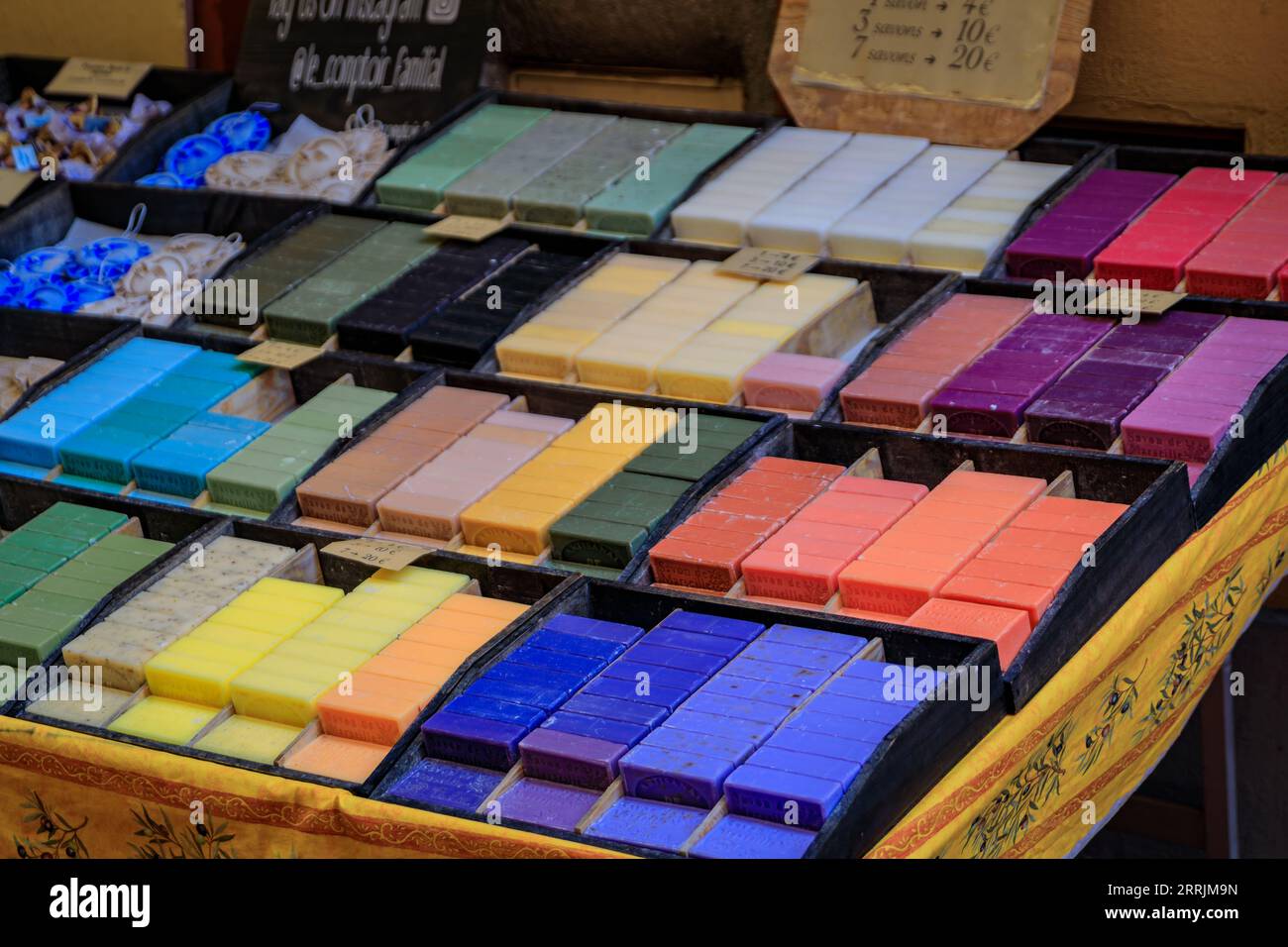 Nice, France - May 28, 2023: Colorful natural lavender, lilac, olive, jasmine, lemon, and other scented soap from Marseille at the Cours Saleya market Stock Photo