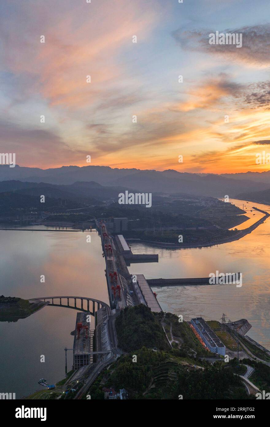 220809 -- ZIGUI, Aug. 9, 2022 -- Aerial photo taken on Aug. 9, 2022 shows the Three Gorges Dam at dawn in Zigui County of Yichang, central China s Hubei Province. Photo by /Xinhua CHINA-HUBEI-THREE GORGES DAM CN WangxGang PUBLICATIONxNOTxINxCHN Stock Photo