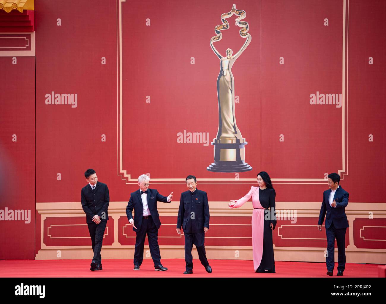 220813 -- BEIJING, Aug. 13, 2022 -- Jury members of Tiantan Awards Li Xuejian C, Guo Fan 1st L, Malcolm Clarke 2nd L, Qin Hailu 2nd R and Wu Jing pose for a group photo on the red carpet of the 12th Beijing International Film Festival in Beijing, capital of China, Aug. 12, 2022.  CHINA-BEIJING-INTERNATIONAL FILM FESTIVAL-RED CARPET CN ChenxZhonghao PUBLICATIONxNOTxINxCHN Stock Photo