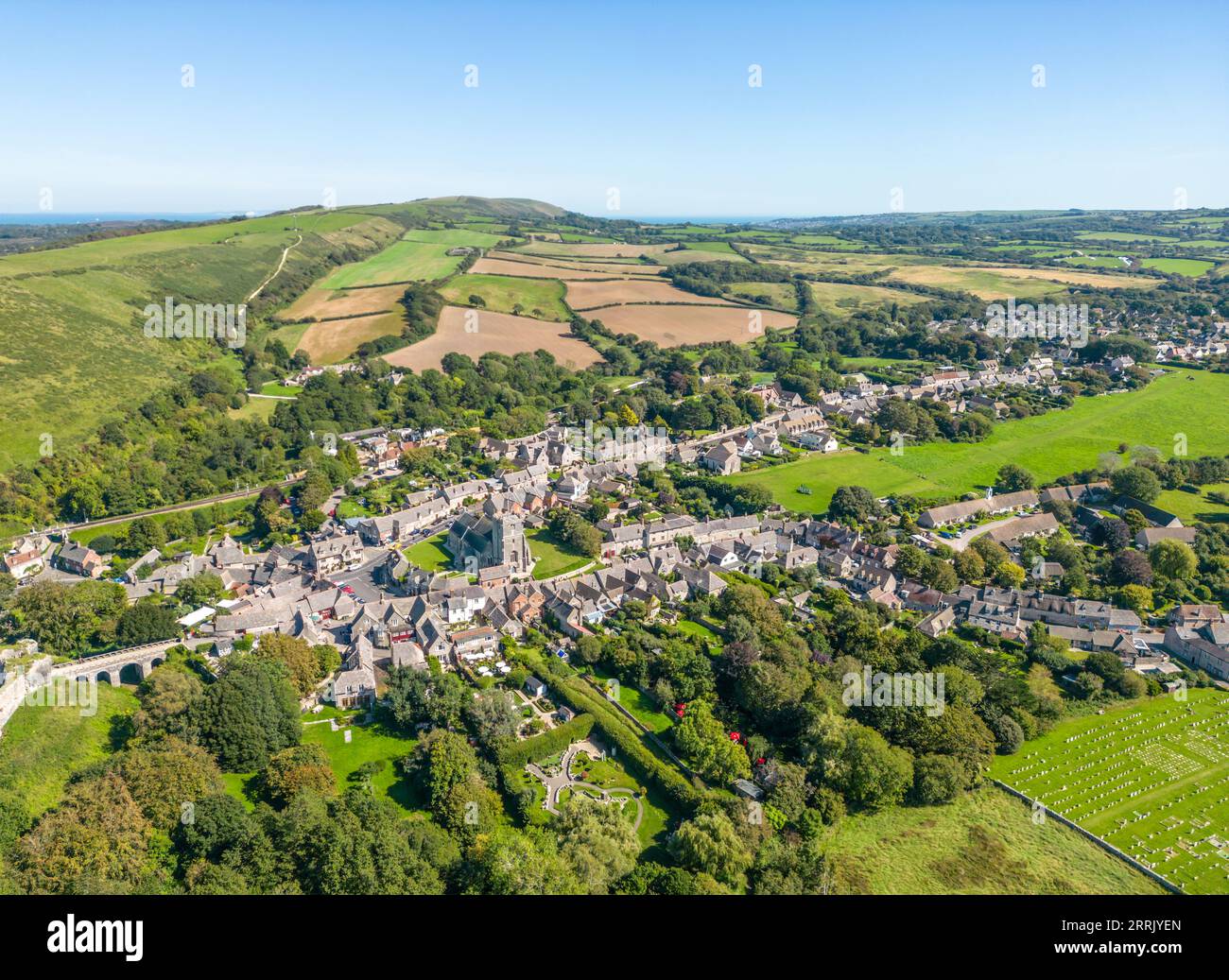 Aerial view over Corfe Castle village in Dorset Stock Photo