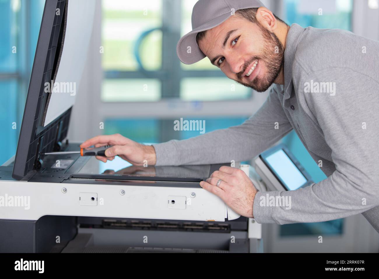 trying to repair the office printer Stock Photo