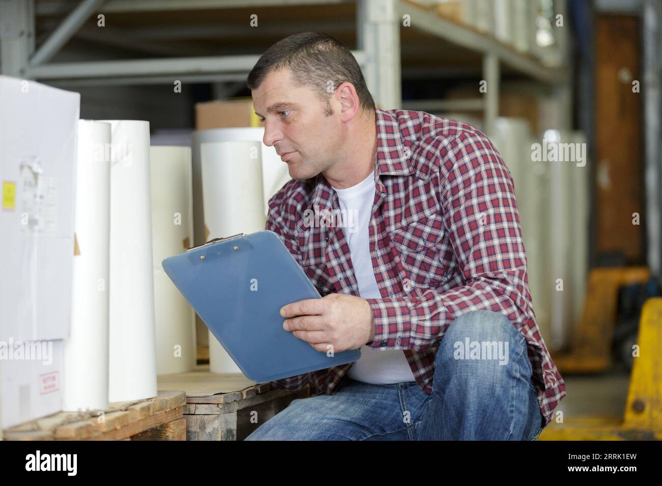 portrait of a handsome typographer at the printing manufacturing Stock Photo