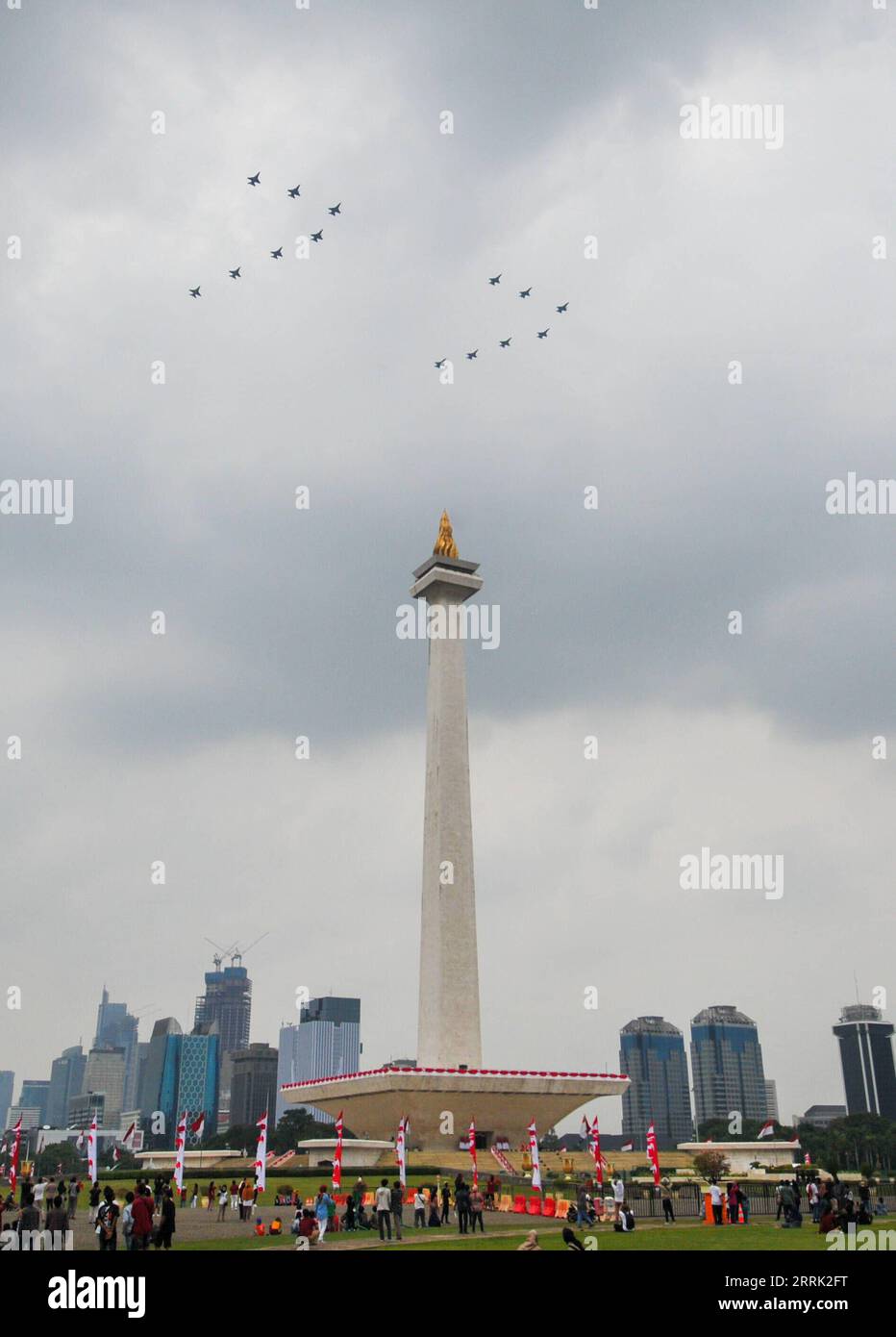 220817 -- JAKARTA, Aug. 17, 2022 -- Indonesian Air Force s aircrafts fly in formation over National Monument during the 77th Independence Day celebration in Jakarta, Indonesia, Aug. 17, 2022.  INDONESIA-JAKARTA-INDEPENDENCE DAY Zulkarnain PUBLICATIONxNOTxINxCHN Stock Photo