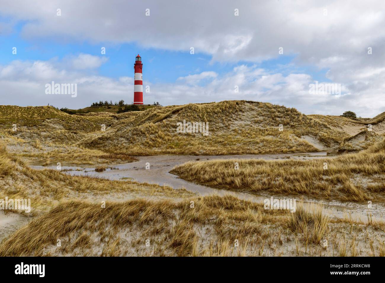 The Leuchttrum Amrum shows sailors the way through into the Wadden Sea Stock Photo