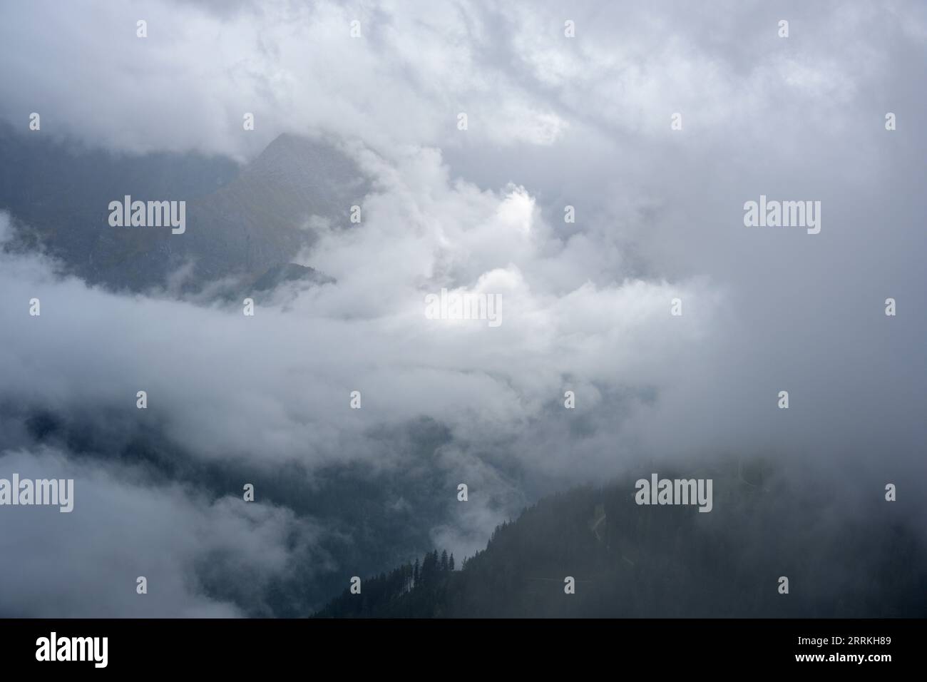 Austria, Tyrol, Zillertal, cloudy mountains in Hintertux valley. Stock Photo