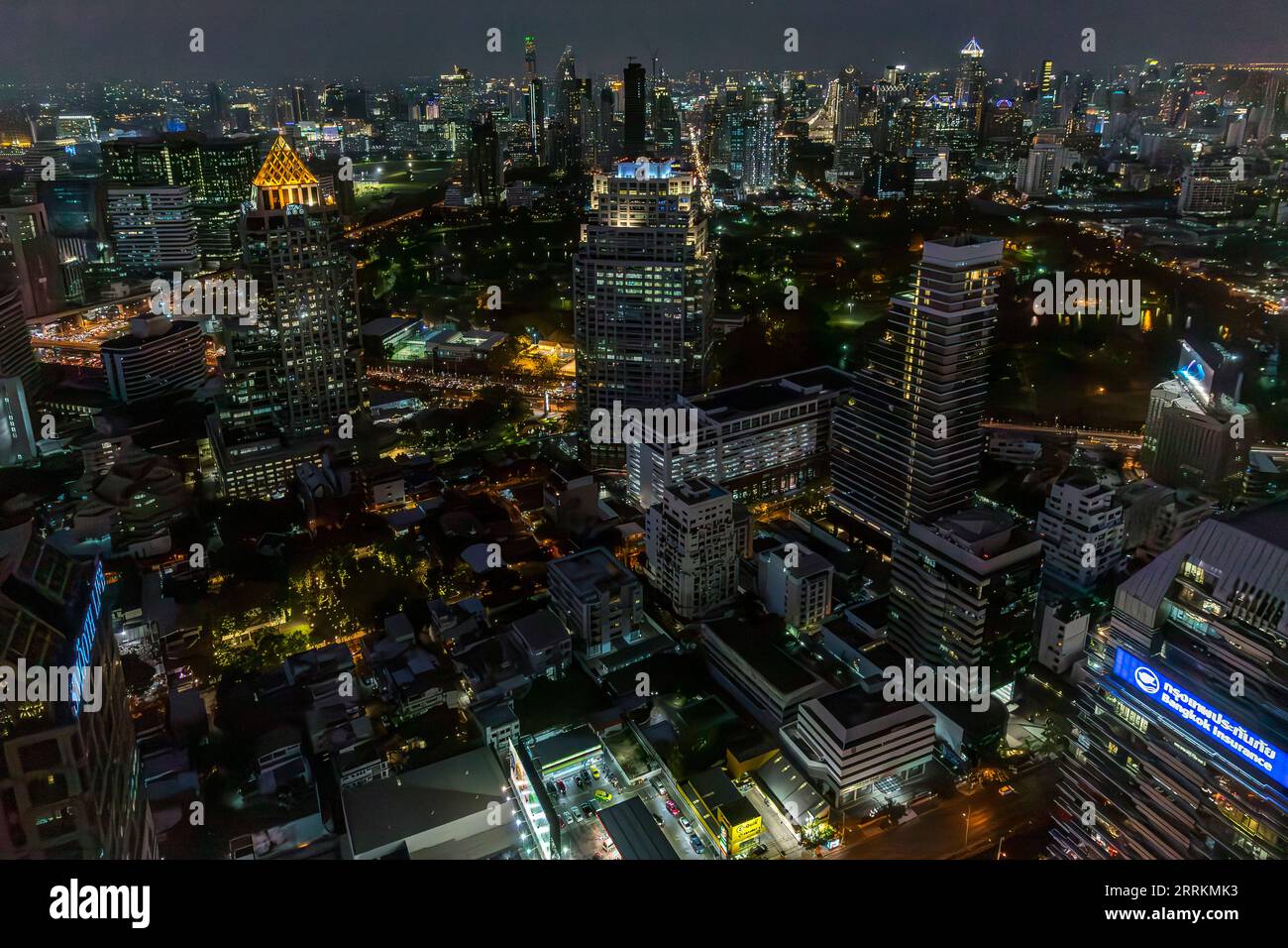 View from the roof terrace of Banyan Tree Bangkok Tower, Crown Plaza Hotel, Abdulrahim Building, U Chu Liang Building, HSBC Bank Building, Sala Daeng One Building, behind Baiyoke Tower II, 309 m, Sathon Tai Road, dusk, Bangkok, Thailand, Asia Stock Photo