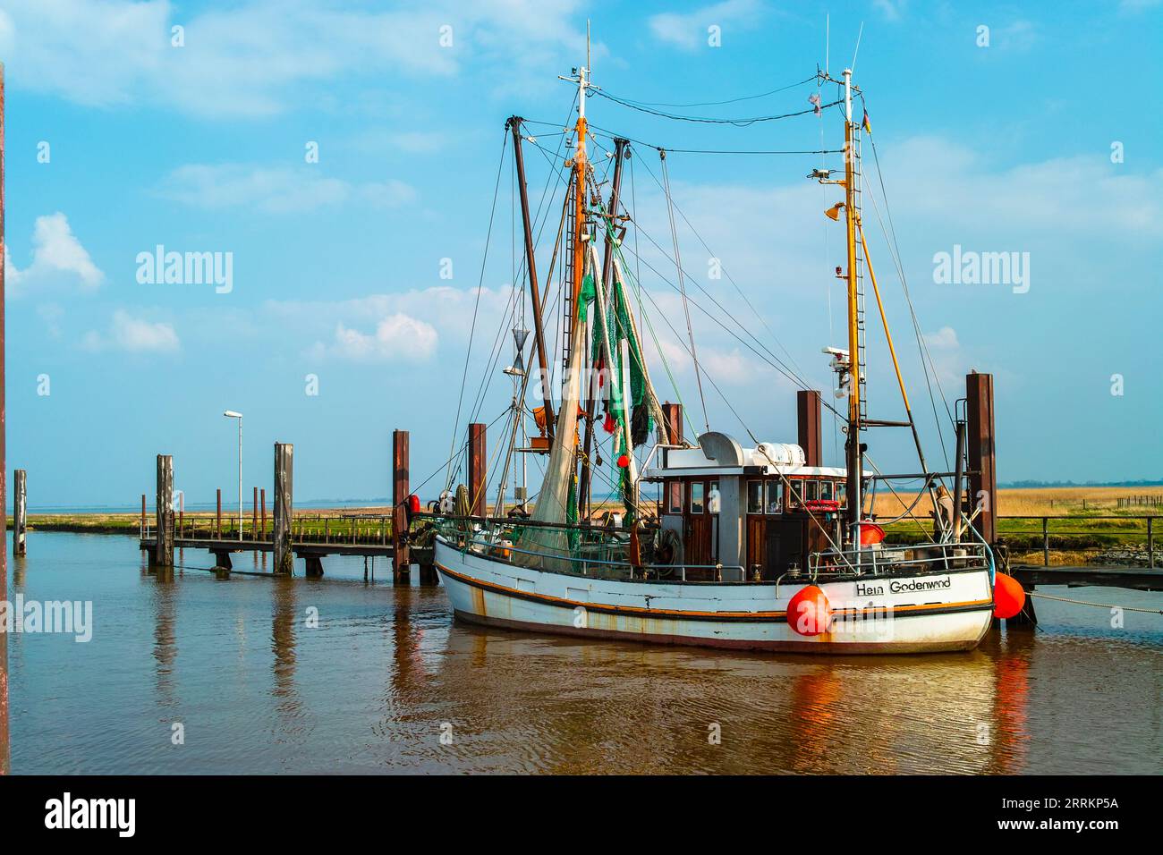 The shrimp cutter 'Godewind' is moored in the outer harbor of Varel. Stock Photo
