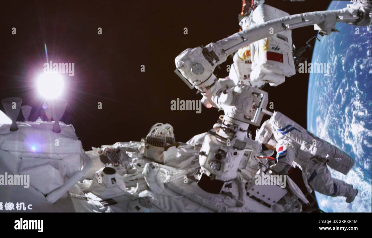 220917 -- BEIJING, Sept. 17, 2022 -- Screen image captured at Beijing Aerospace Control Center on Sept. 17, 2022 shows Shenzhou-14 astronauts Cai Xuzhe top and Chen Dong conducting extravehicular activities EVAs. China s Shenzhou-14 astronauts Cai Xuzhe and Chen Dong successfully exited the space station lab module Wentian on Saturday to conduct EVAs, according to the China Manned Space Agency CMSA.  EyesonSciCHINA-WENTIAN-SHENZHOU-14 ASTRONAUTS-EXTRAVEHICULAR ACTIVITIES CN GuoxZhongzheng PUBLICATIONxNOTxINxCHN Stock Photo