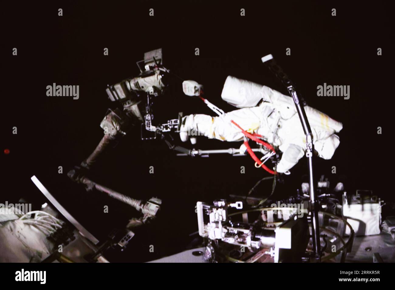 220917 -- BEIJING, Sept. 17, 2022 -- Screen image captured at Beijing Aerospace Control Center on Sept. 17, 2022 shows Shenzhou-14 astronaut Cai Xuzhe conducting extravehicular activities EVAs. China s Shenzhou-14 astronauts Cai Xuzhe and Chen Dong successfully exited the space station lab module Wentian on Saturday to conduct EVAs, according to the China Manned Space Agency CMSA.  EyesonSciCHINA-WENTIAN-SHENZHOU-14 ASTRONAUTS-EXTRAVEHICULAR ACTIVITIES CN GuoxZhongzheng PUBLICATIONxNOTxINxCHN Stock Photo