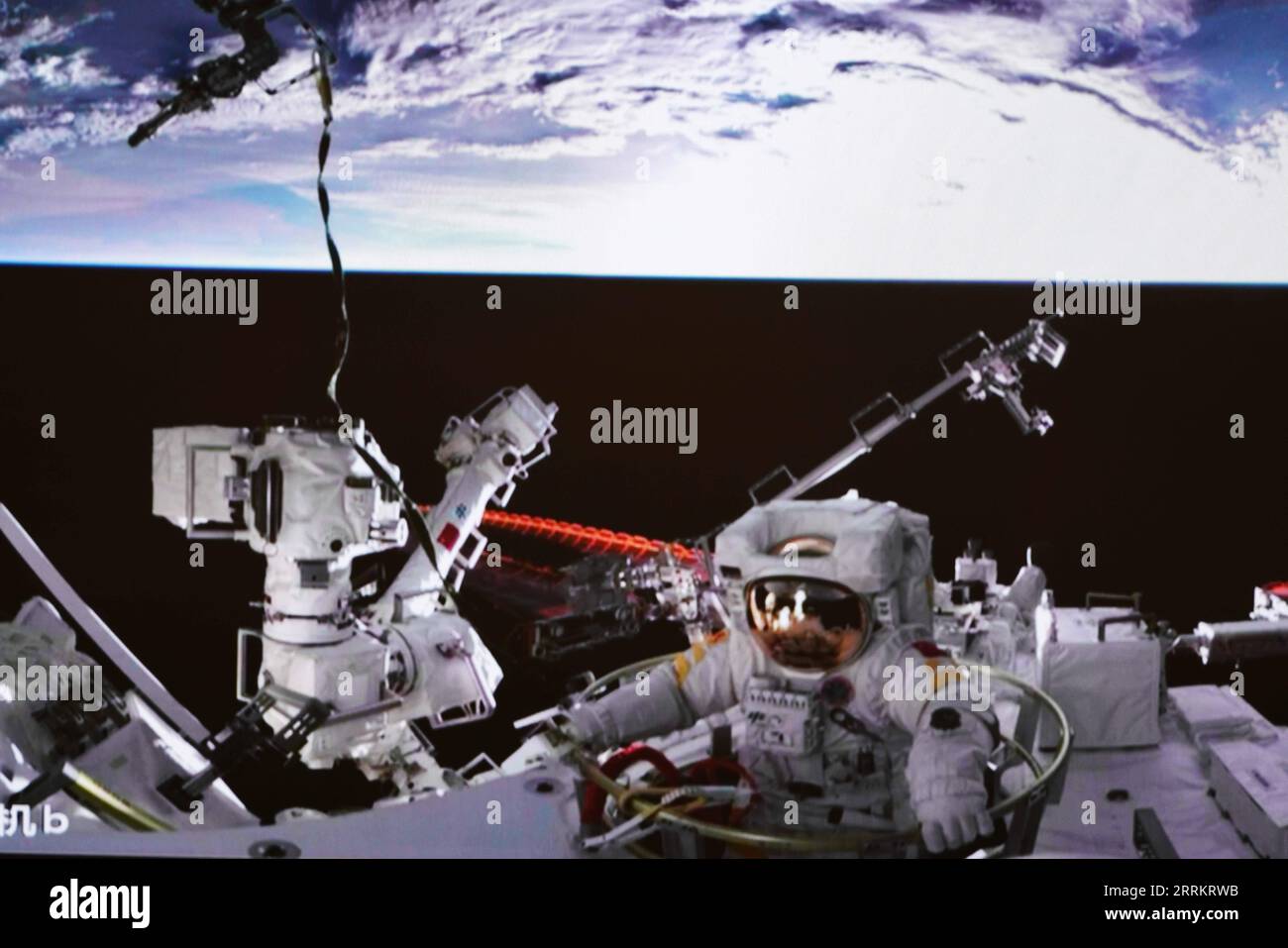 220917 -- BEIJING, Sept. 17, 2022 -- Screen image captured at Beijing Aerospace Control Center on Sept. 17, 2022 shows Shenzhou-14 astronaut Cai Xuzhe exiting the space station lab module Wentian to conduct extravehicular activities EVAs. China s Shenzhou-14 astronauts Cai Xuzhe and Chen Dong successfully exited the space station lab module Wentian on Saturday to conduct EVAs, according to the China Manned Space Agency CMSA.  EyesonSciCHINA-WENTIAN-SHENZHOU-14 ASTRONAUTS-EXTRAVEHICULAR ACTIVITIES CN GuoxZhongzheng PUBLICATIONxNOTxINxCHN Stock Photo