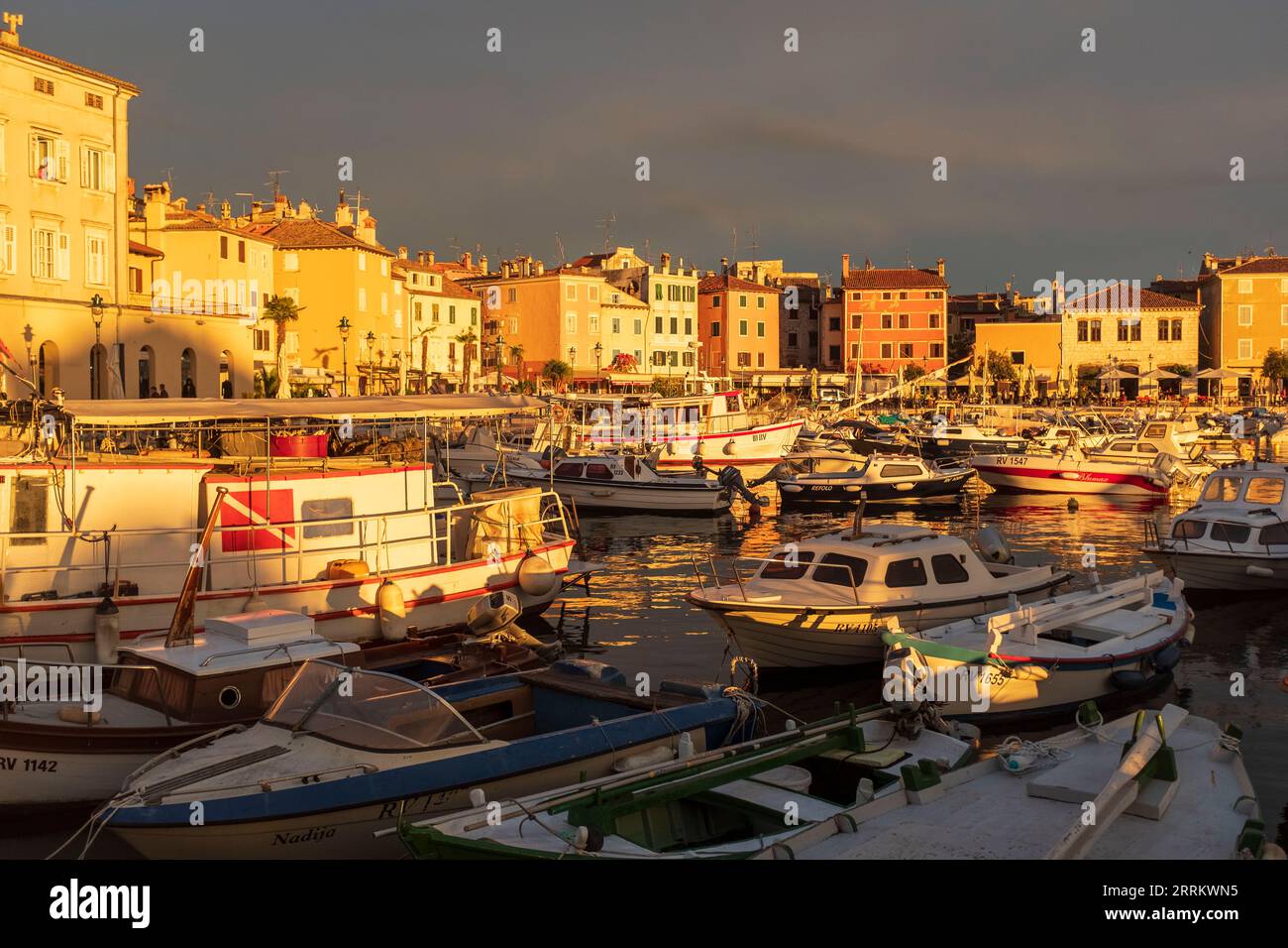 View of small marina in the center of Rovinj, Croatia, at the sunset Stock Photo