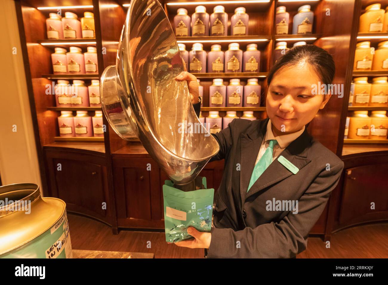 England, London, Piccadilly, Fortnum & Mason Store, Tea Department, Shop Assistant Weighing Tea Stock Photo