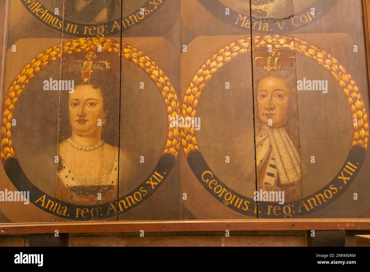 England, Sussex, West Sussex, Chichester, Chichester Cathedral, Interior View of Medieval Painted Paneal depicting Portrait of Queen Anne and King George 1 Stock Photo