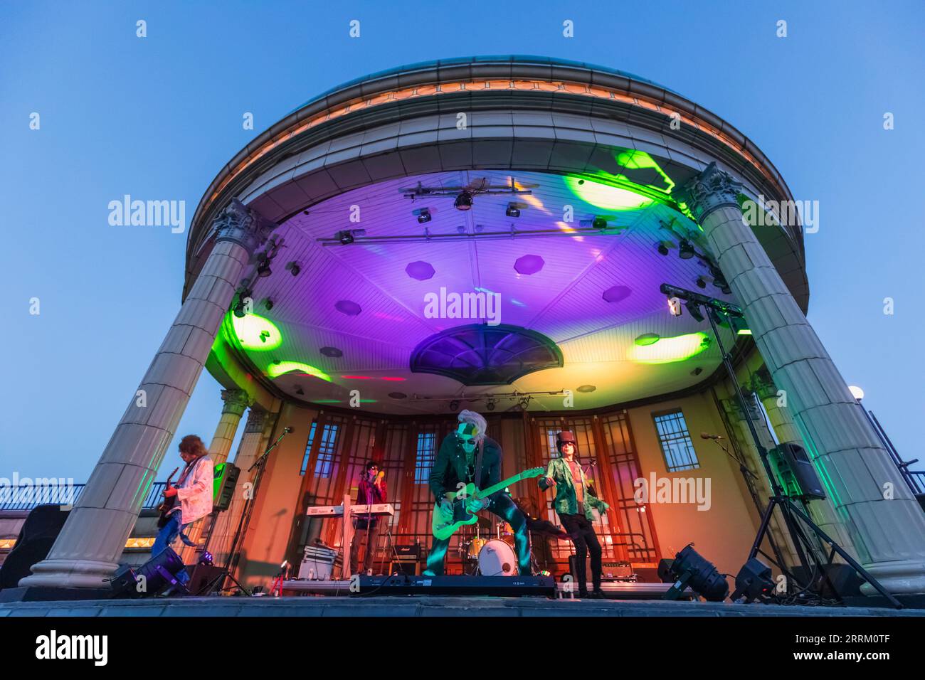 England, Sussex, East Sussex, Eastbourne, Eastbourne Bandstand, 'Not the Rolling Stones' Tribute Band Performing Stock Photo