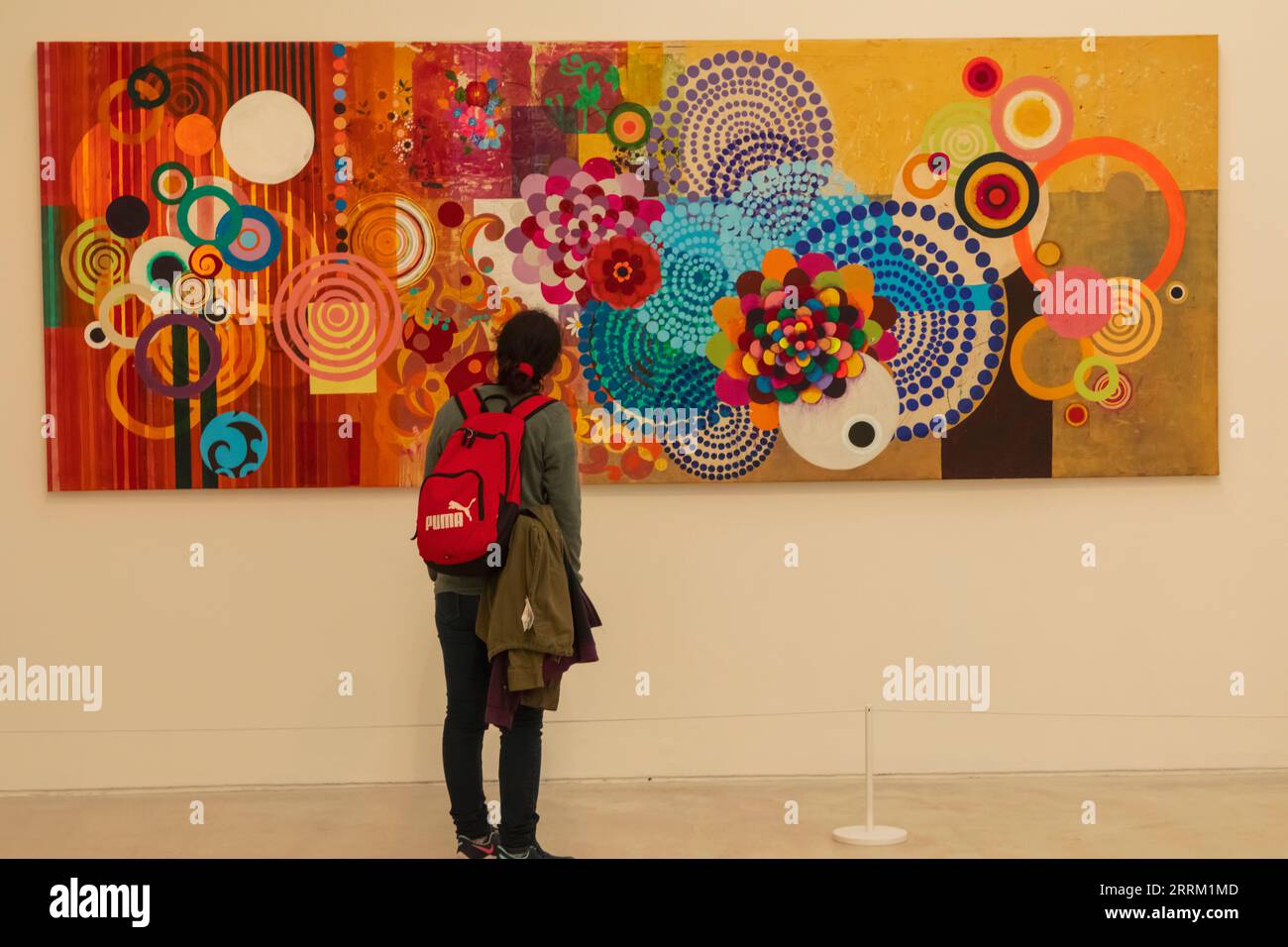 England, Kent, Margate, Turner Contemporary Art Gallery, Visitor Viewing Artwork by Brazilian Artist Beatriz Milhazes Stock Photo