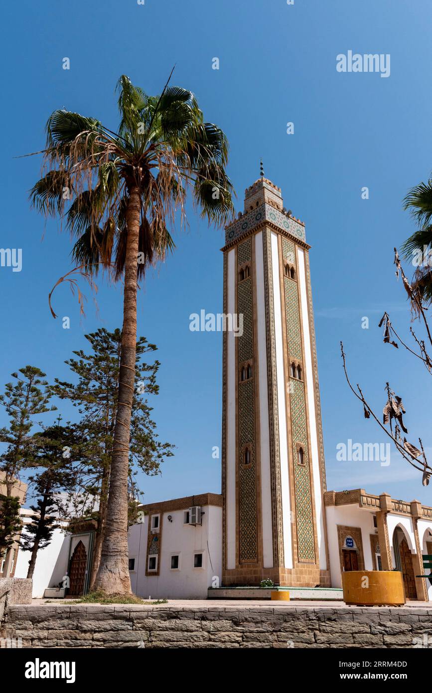 Lebanon mosque in downtown Agadir with a rich decorated tower and green  fresco, Morocco Stock Photo - Alamy