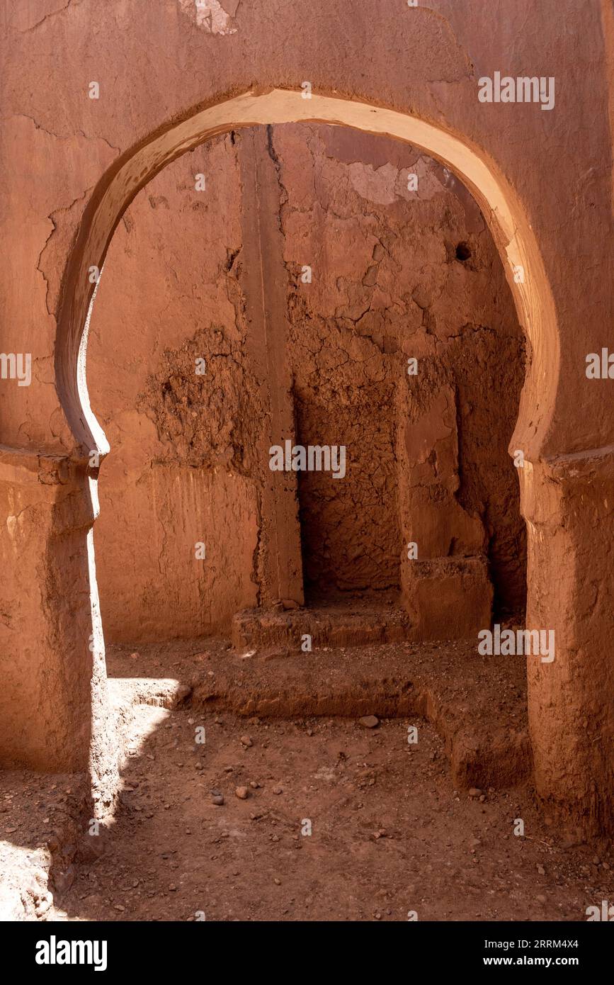 A beautiful simple arch built of clay in an old kasbah in the Draa valley, Morocco Stock Photo