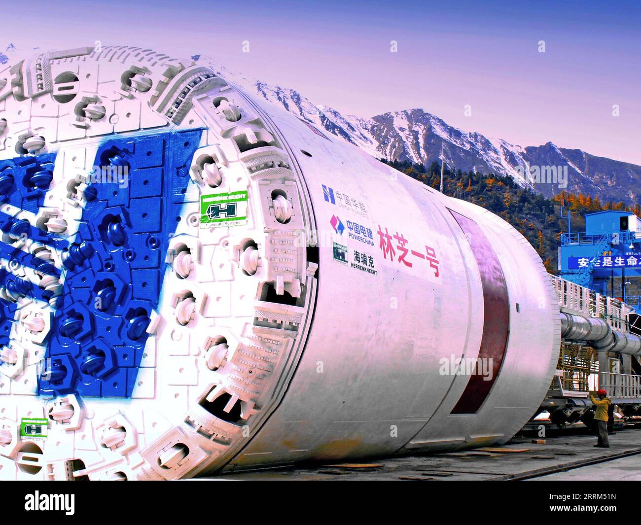 221001 -- LHASA, Oct. 1, 2022 -- Photo taken on Oct. 29, 2015 shows the tunnel boring machine TBM being completed for the construction of Doxong Pass tunnel on the highway linking Pad Township in the city of Nyingchi and Medog County, southwest China s Tibet Autonomous Region. The 67.22-km road connects Pad Township in the city of Nyingchi and Medog County. It is the second passageway to Medog, following the first one connecting the county and Zhamog Township, Bomi County. After the new highway opens to traffic, the length of the road connecting the city proper of Nyingchi and Medog County wil Stock Photo