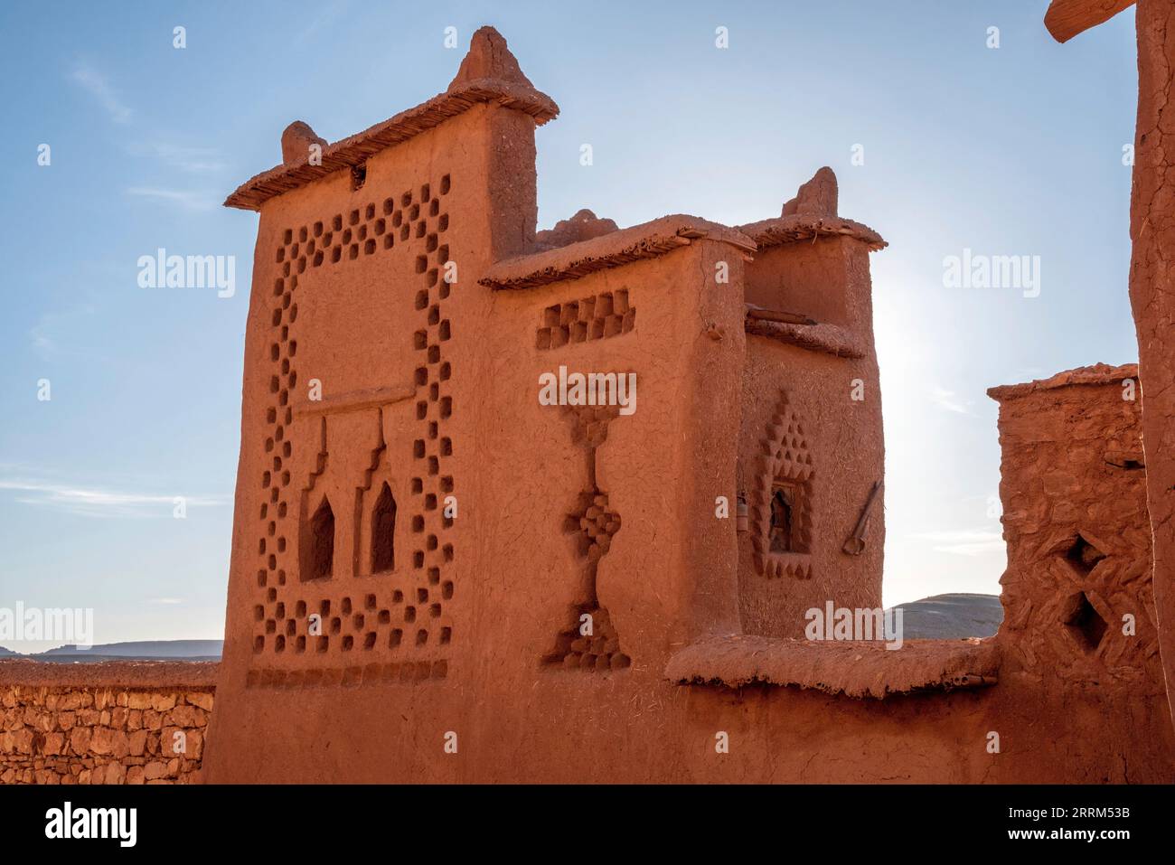 Scenic ornate detail of a small tower over the roofs of the historic Ait Ben Haddou village, Morocco Stock Photo