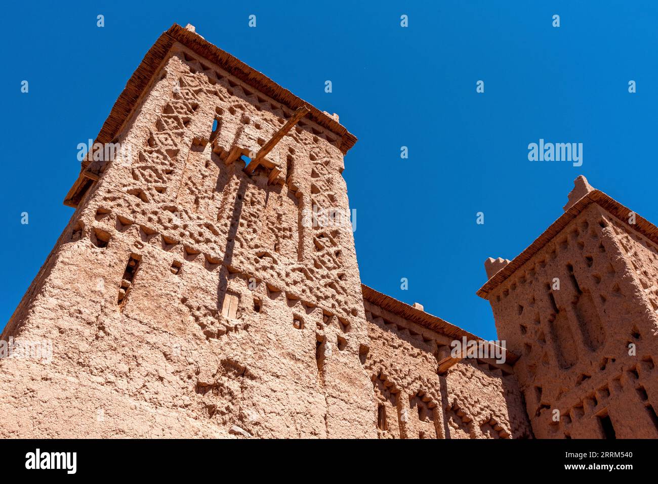 Traditional ornate facade of a Moroccan Kasbah at the famous Road of the Kasbahs Stock Photo