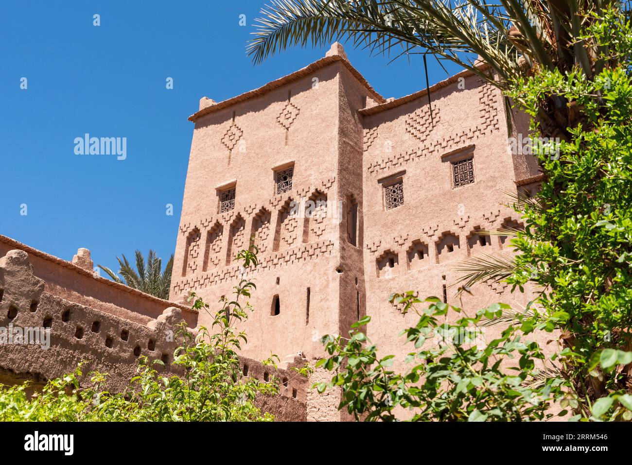 Traditional ornate facade of a Moroccan Kasbah at the famous Road of the Kasbahs Stock Photo