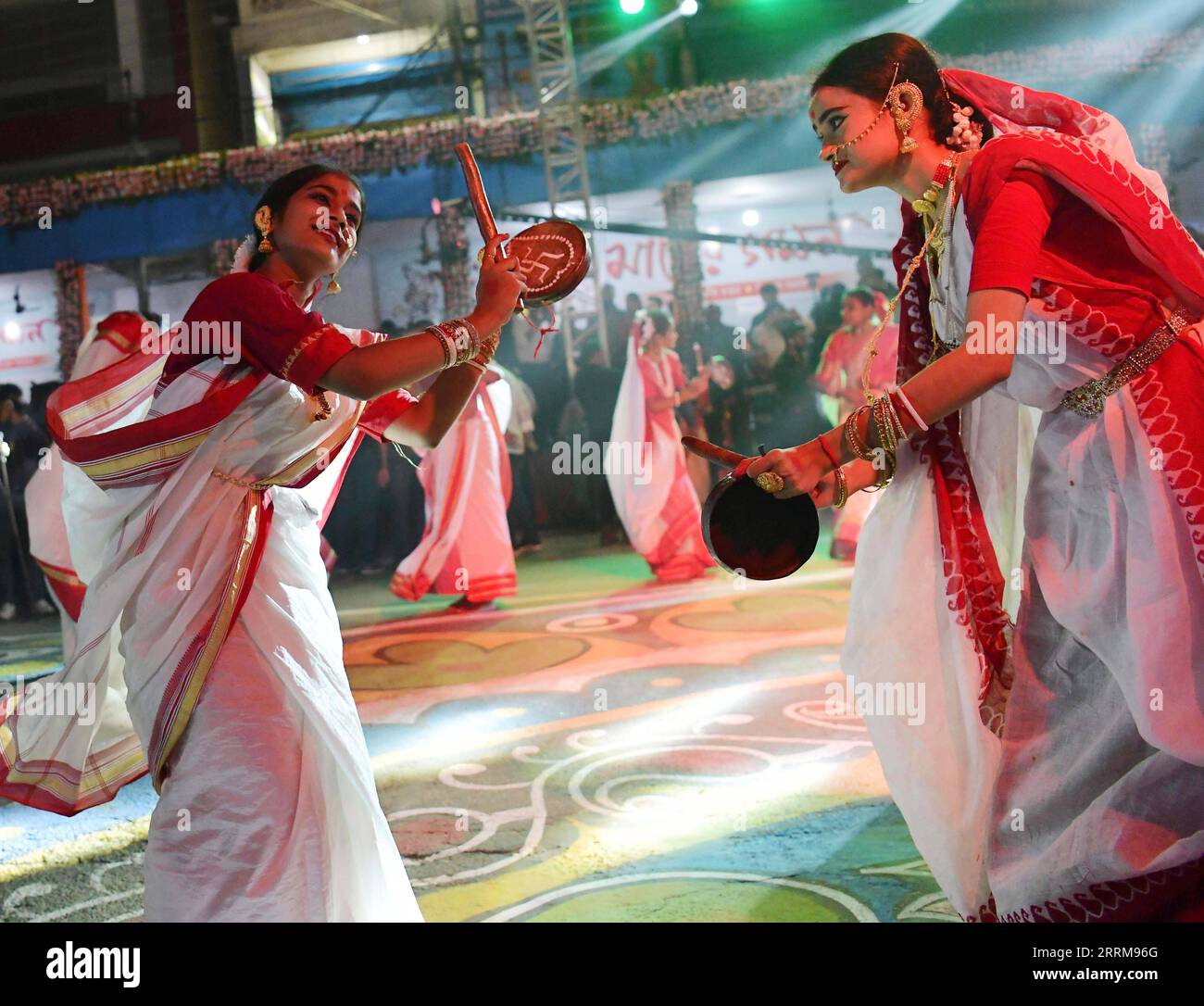 221007 -- AGARTALA INDIA, Oct. 7, 2022 -- Dancers perform during Durga Puja carnival in Agartala, the capital city of Tripura, northeastern India, on Oct. 7, 2022. Str/Xinhua INDIA-AGARTALA-DURGA PUJA CARNIVAL JavedxDar PUBLICATIONxNOTxINxCHN Stock Photo