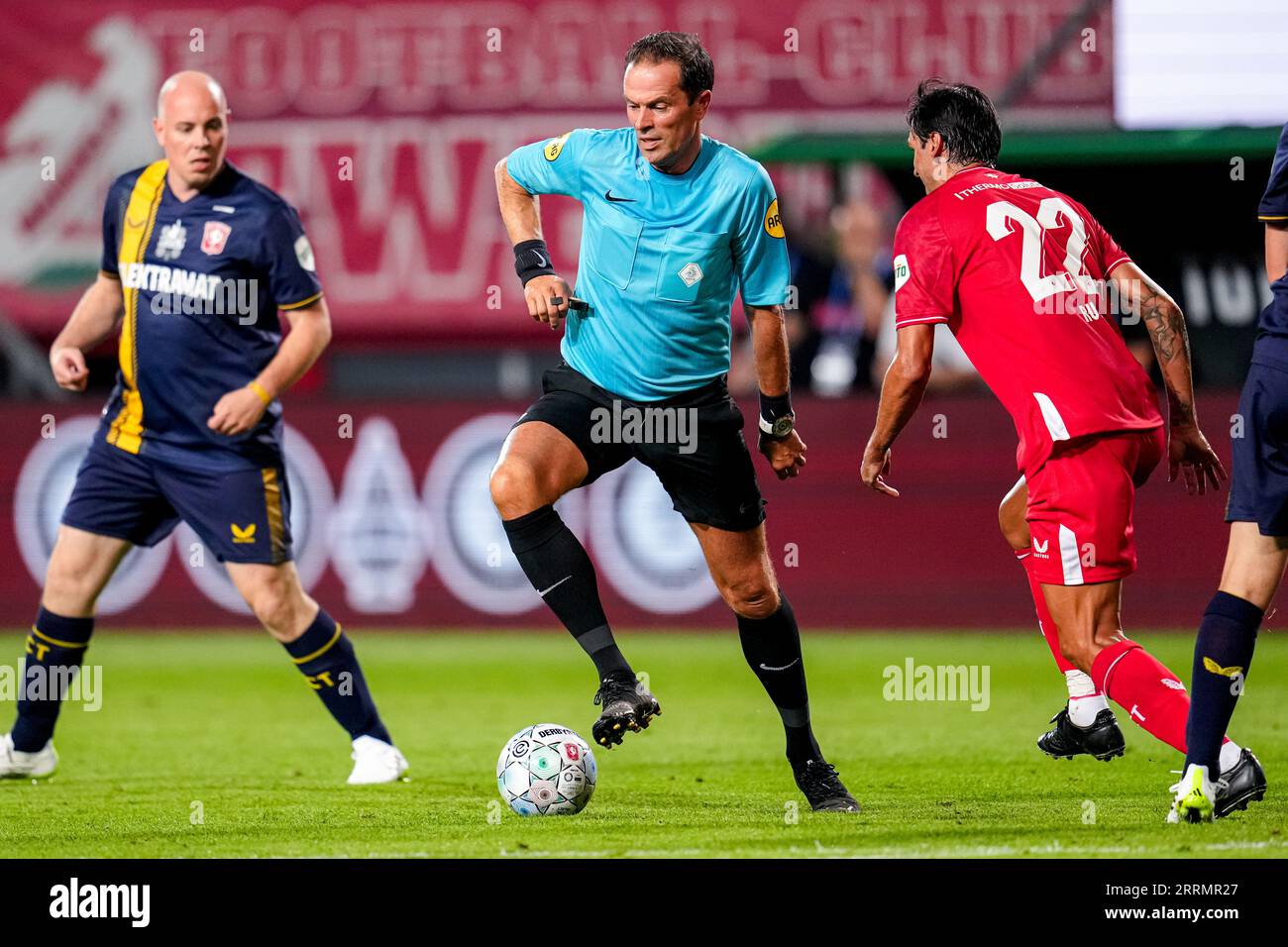 Enschede, Netherlands. 08th Sep, 2023. ENSCHEDE, NETHERLANDS - SEPTEMBER 8: Referee Bas Nijhuis avoids the ball, Bryan Ruiz of FC Twente 2010 & 2011 during the Farewell match of Wout Brama between FC Twente 2010 & 2011 and Wouts All Stars at De Grolsch Veste on September 8, 2023 in Enschede, Netherlands. (Photo by Patrick Goosen/Orange Pictures) Credit: Orange Pics BV/Alamy Live News Stock Photo