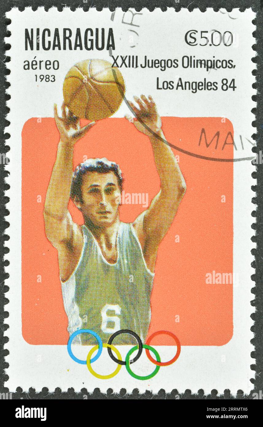 Cancelled postage stamp printed by Nicaragua, that shows Basketball, Summer Olympic Games 1984 - Los Angeles, circa 1983. Stock Photo