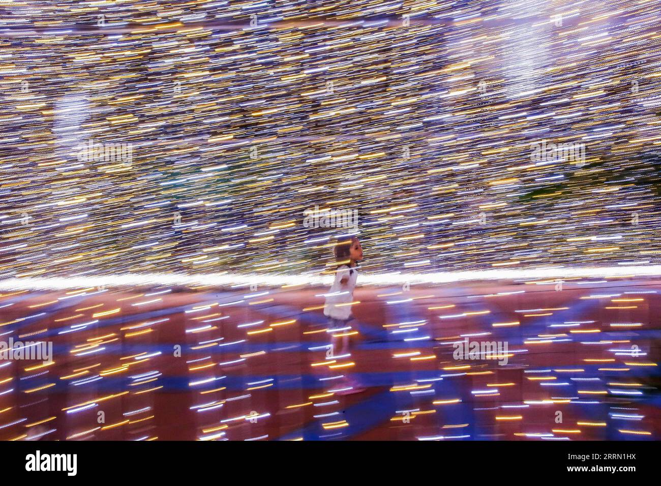 221128 Quezon City Nov 28 2022 A Girl Runs Through A Christmas