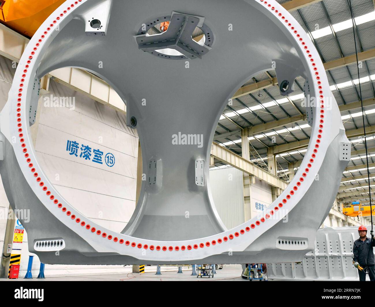 221217 -- BEIJING, Dec. 17, 2022 -- Staff members work at a workshop of a wind power equipment industrial base in Huimin County, east China s Shandong Province, June 7, 2022.  Xinhua Headlines: China expected to boost world economic recovery in 2023 GuoxXulei PUBLICATIONxNOTxINxCHN Stock Photo