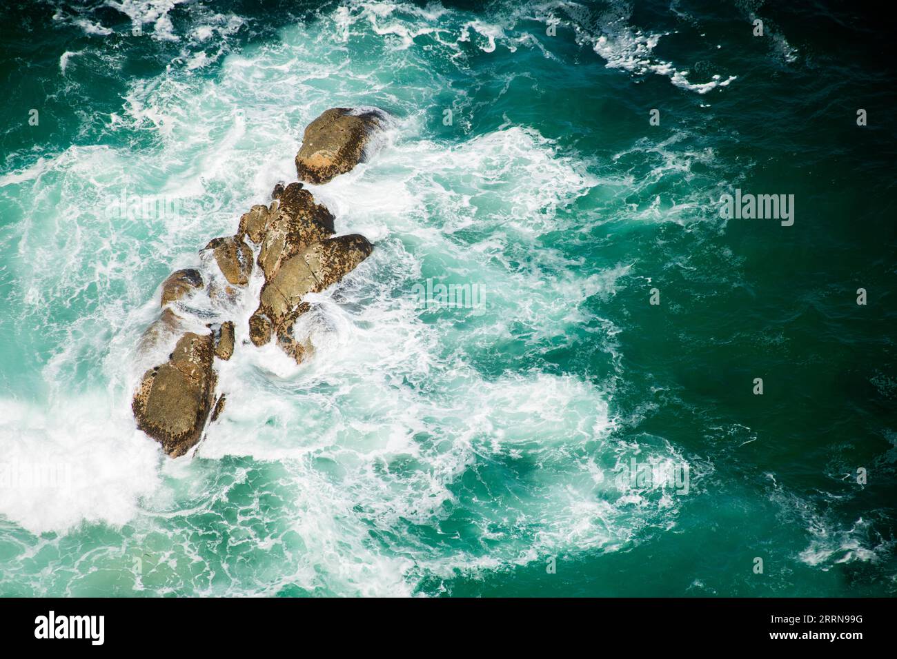 Cliffs and Waves crashing at Cape of Good Hope Stock Photo