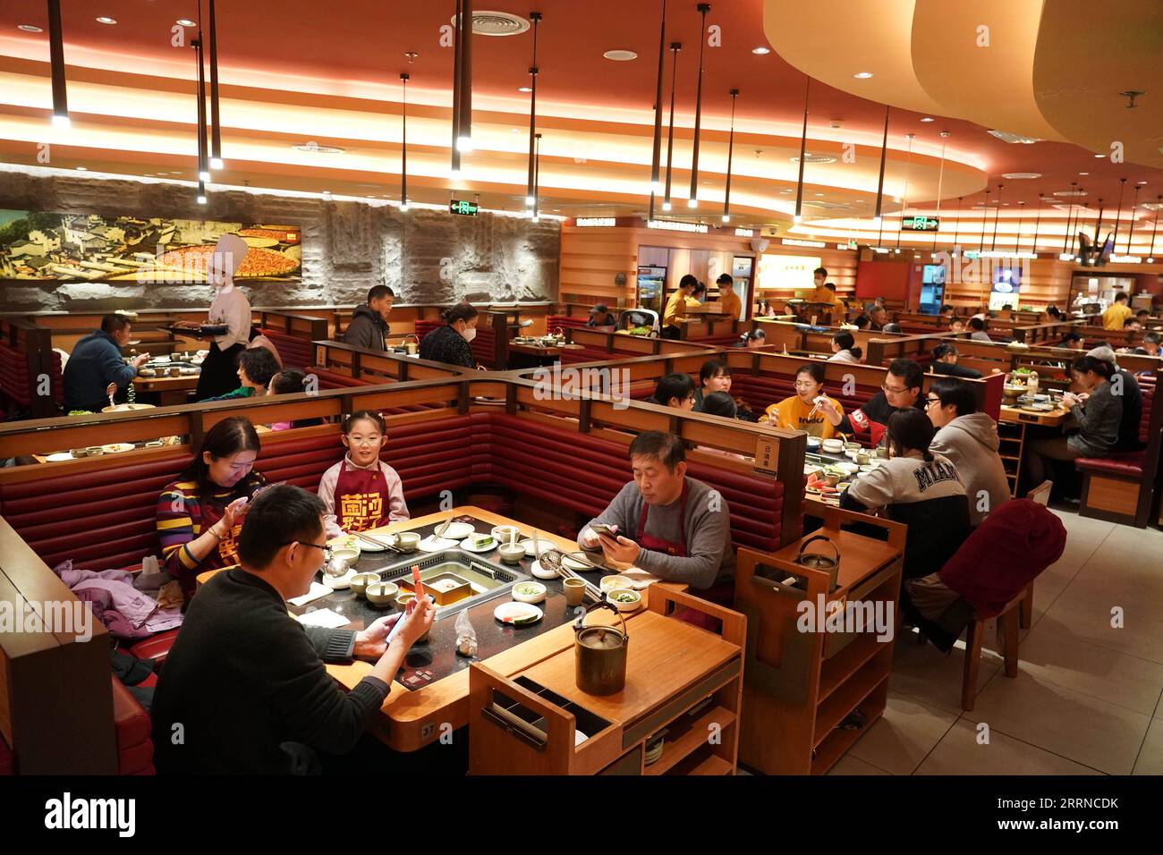 230103 -- BEIJING, Jan. 3, 2023 -- People dine at a restaurant in Beijing, capital of China, Jan. 1, 2023.  Xinhua Headlines: China sees New Year consumption recovery, eyes 2023 growth RenxChao PUBLICATIONxNOTxINxCHN Stock Photo
