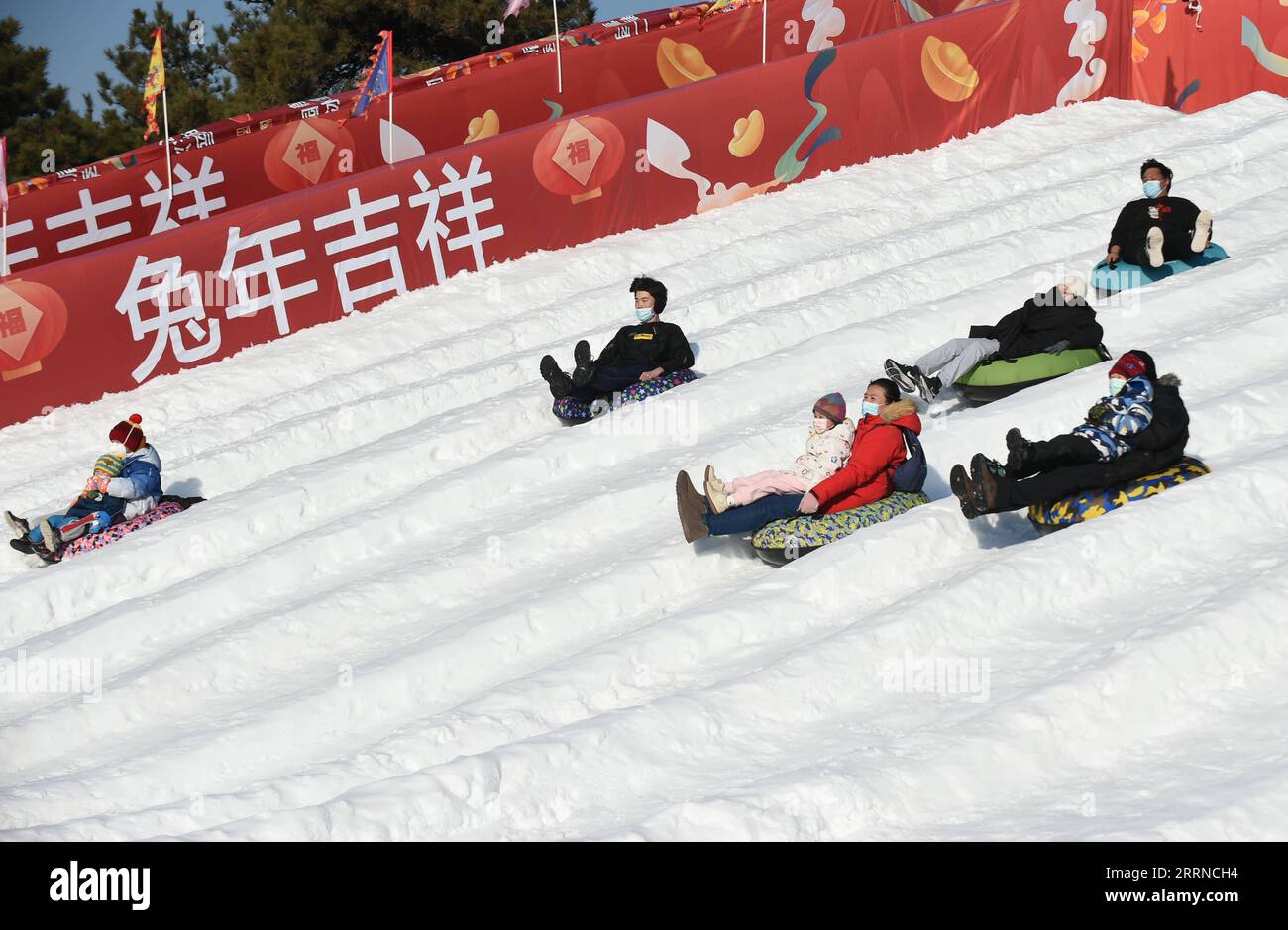 230103 -- BEIJING, Jan. 3, 2023 -- Visitors have fun during the ice and snow festival at Yuanmingyuan Park in Beijing, capital of China, Dec. 31, 2022.  Xinhua Headlines: China sees New Year consumption recovery, eyes 2023 growth LuoxXiaoguang PUBLICATIONxNOTxINxCHN Stock Photo