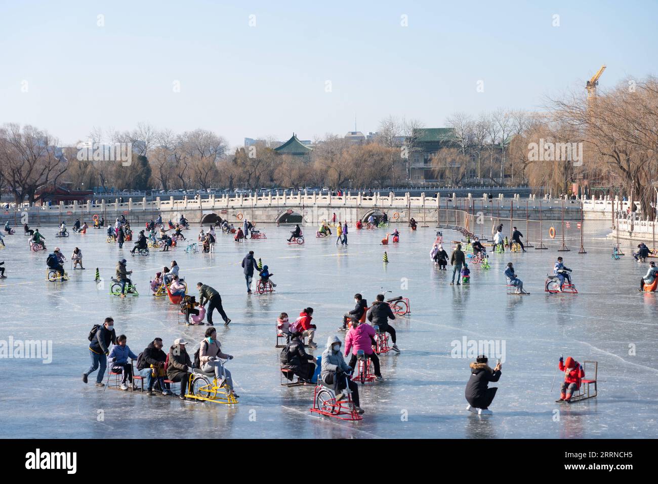 230103 -- BEIJING, Jan. 3, 2023 -- People have fun on the ice rink at Beihai Park in Beijing, capital of China, Dec. 31, 2022.  Xinhua Headlines: China sees New Year consumption recovery, eyes 2023 growth ChenxZhonghao PUBLICATIONxNOTxINxCHN Stock Photo