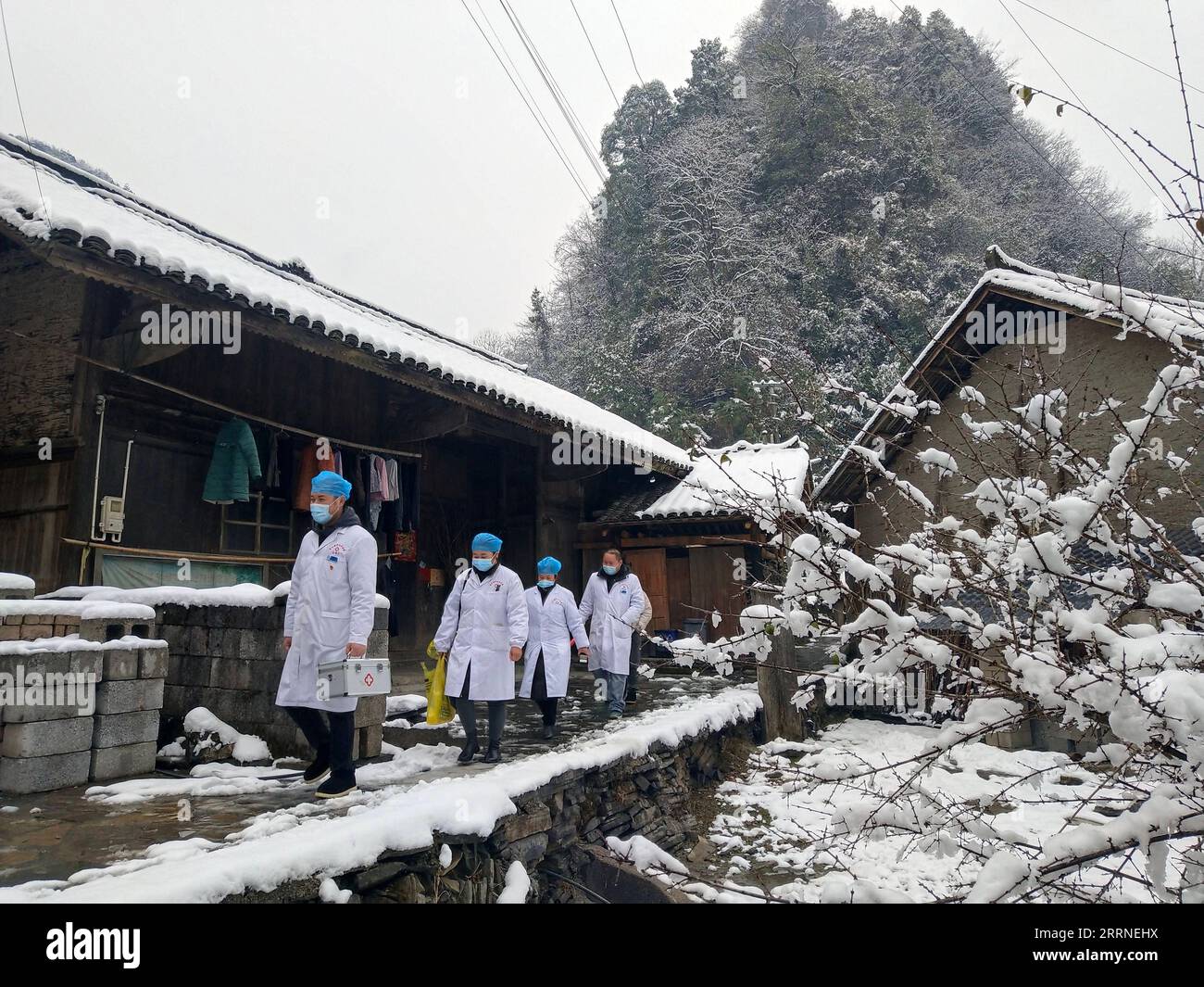 230107 -- BEIJING, Jan. 7, 2023 -- Rural doctors visit local households to provide medical support in Jiwei Town of Huayuan County, central China s Hunan Province, Dec. 29, 2022. Photo by /Xinhua Xinhua Headlines: Six fallacies and truths about China s epidemic control JianxBiao PUBLICATIONxNOTxINxCHN Stock Photo