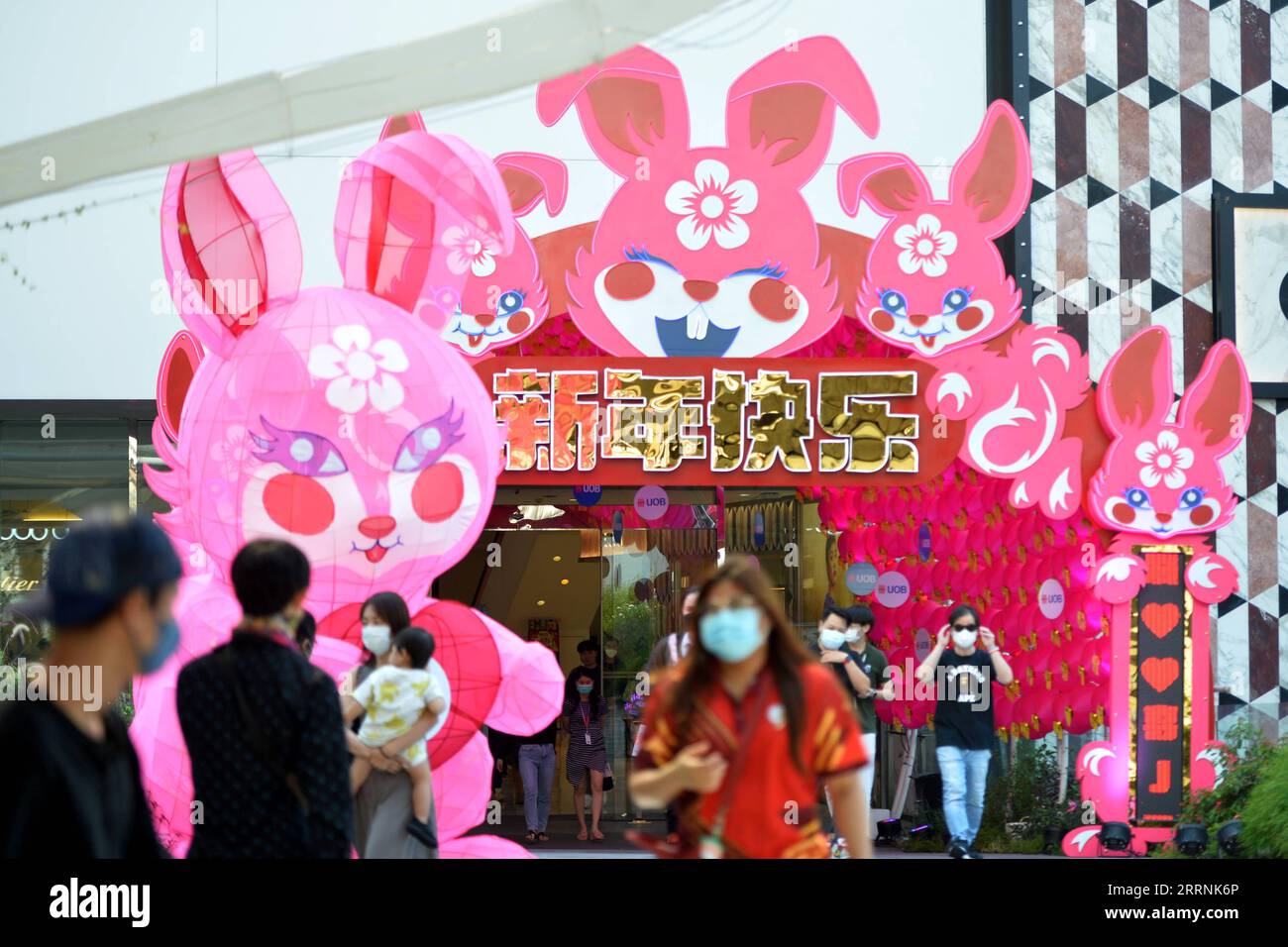 230118 -- BANGKOK, Jan. 18, 2023 -- Decorations for the upcoming Lunar New Year are seen in front of a shopping mall in Bangkok, Thailand on Jan. 18, 2023. Rachen Sageamsak THAILAND-BANGKOK-LUNAR NEW YEAR-DECORATIONS LaxHeng PUBLICATIONxNOTxINxCHN Stock Photo