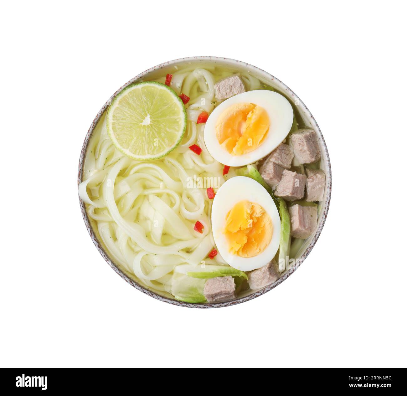 Bowl of delicious rice noodle soup with meat and egg isolated on white