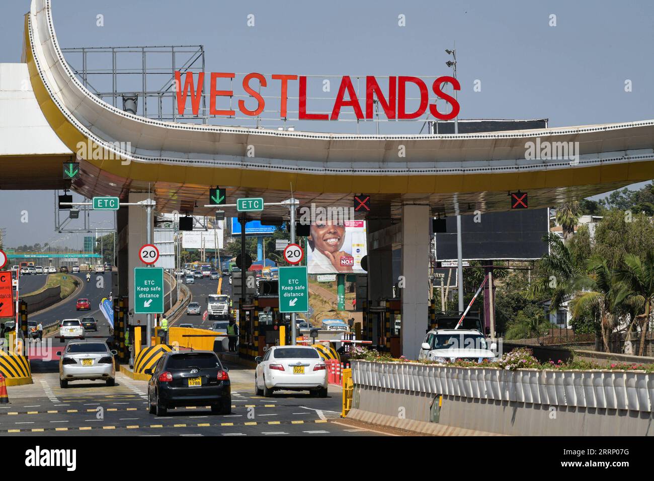 230208 NAIROBI, Feb. 8, 2023 Vehicles enter and exit the Nairobi