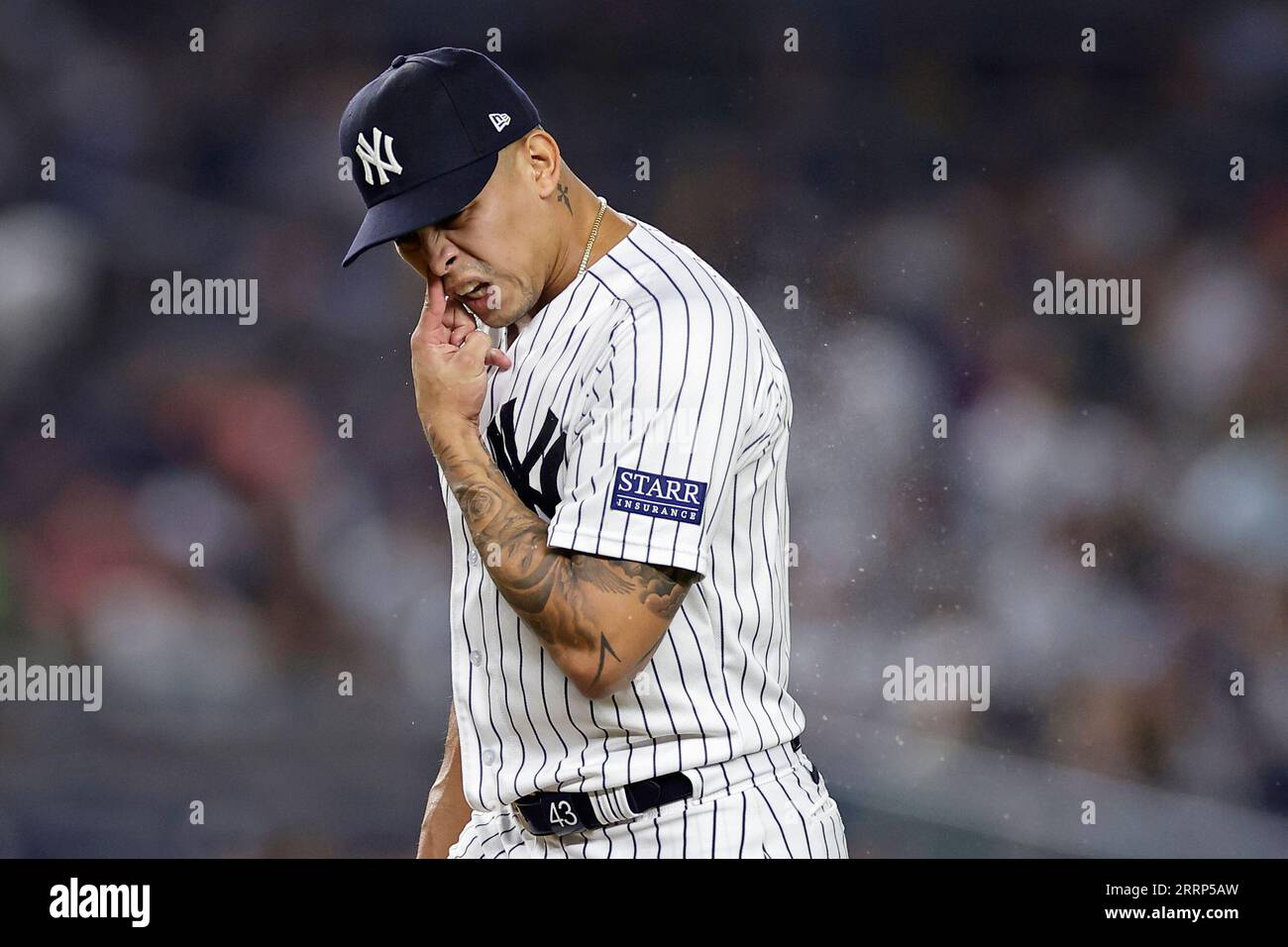 New York Yankees pitcher Jonathan Loaisiga reacts during the seventh