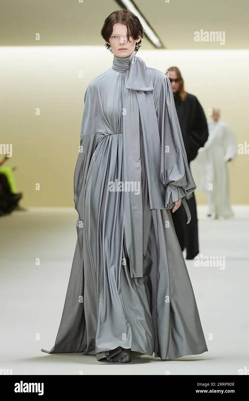 230306 -- PARIS, March 6, 2023 -- A model presents a creation by Balenciaga  as part of its Fall/Winter 2023/2024 pret-a-porter collections during the  Paris Fashion Week, in Paris, France, on March