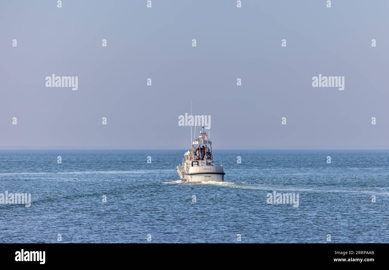 US Coast Guard cutter, #47136 heading out from Montauk Coast Guard Station Stock Photo