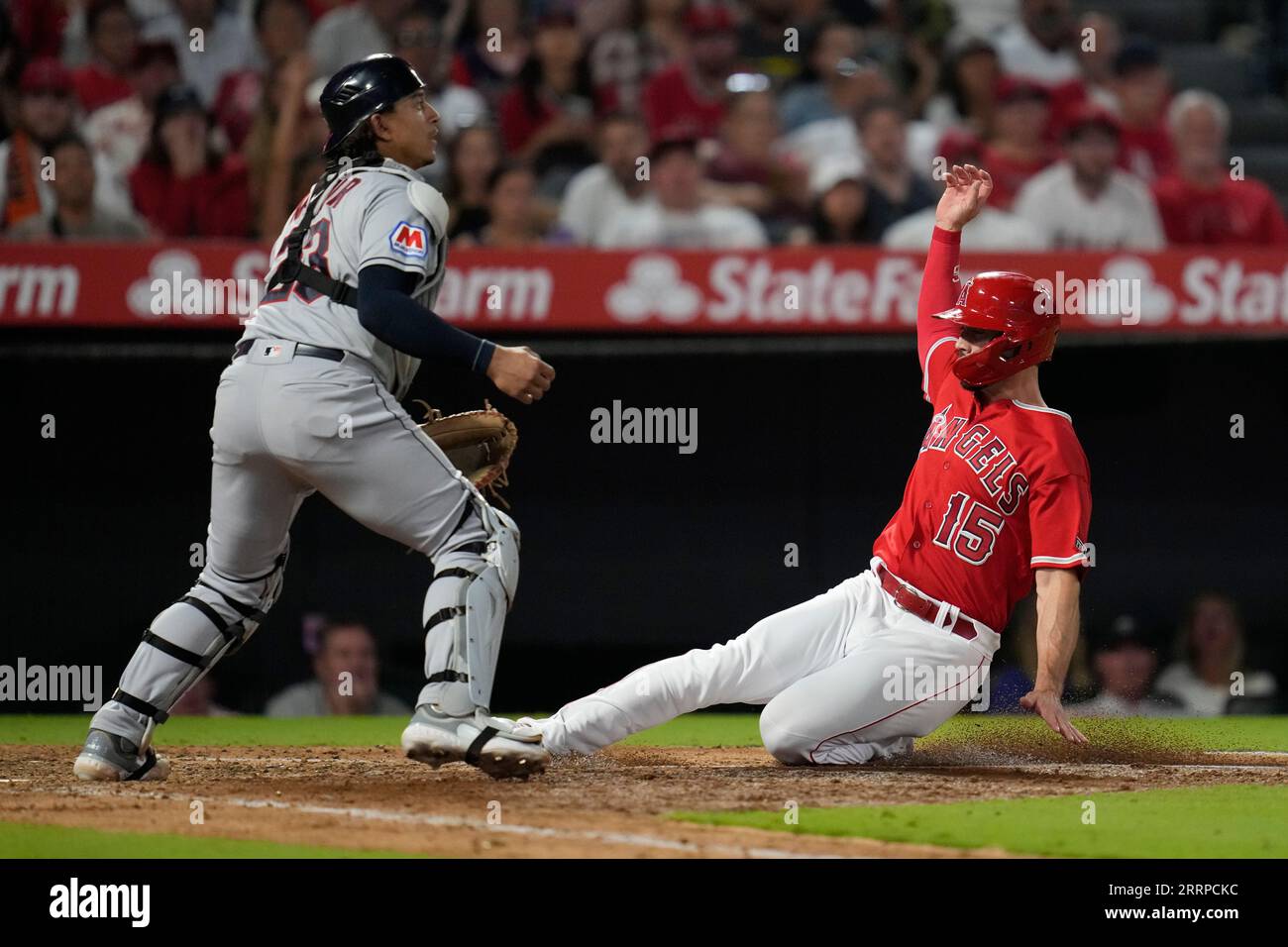 Los Angeles Angels' Randal Grichuk (15) scores off of a sacrifice fly ...